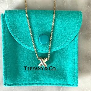 Tiffany & Co. vintage retired “x” necklace, sterling silver, with pouch.
